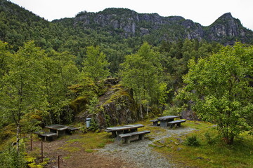 Stone benches at the resting place Allmannajuvet at the scenic route Ryfylke in Norway, Europe
