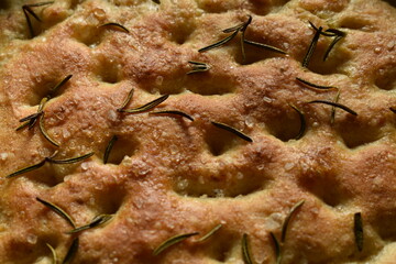 Homemade freshly baked rosemary focaccia surface