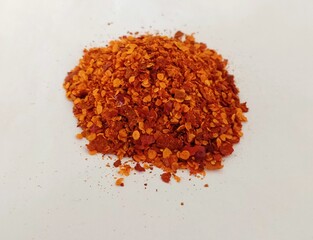 Red chilli Powder on white background 