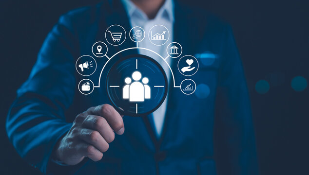 Target customer, buyer persona, customer behavior concept. Marketing plan and strategies. Personalization marketing, customer centric strategies. Businessman showing on screen to target customer.