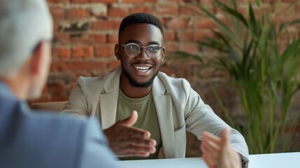 Smiling professional at a meeting - obrazy, fototapety, plakaty