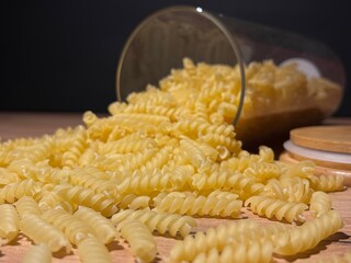 Fusilli pasta in a glass jar. High quality photo