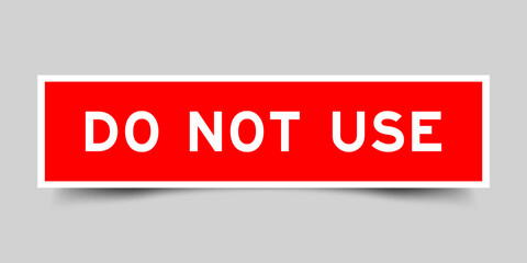 Red color square label sticker with word do not use that inserted in gray background