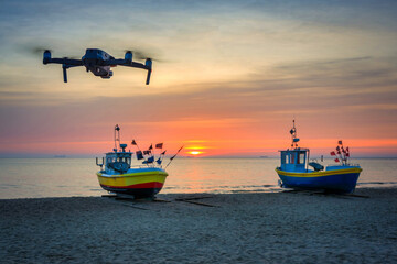 Drone recording sunrise on the beach of Baltic Sea in Sopot, Poland