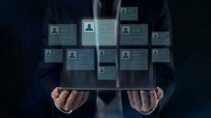 Businessman choose a person among candidates on a virtual pad display. Human resource job concept