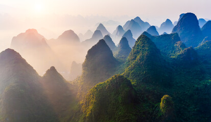 Aerial view of karst mountain natural landscape at sunrise in Guilin. Famous holiday resorts in...