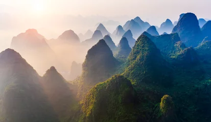Papier Peint photo Guilin Aerial view of karst mountain natural landscape at sunrise in Guilin. Famous holiday resorts in China.