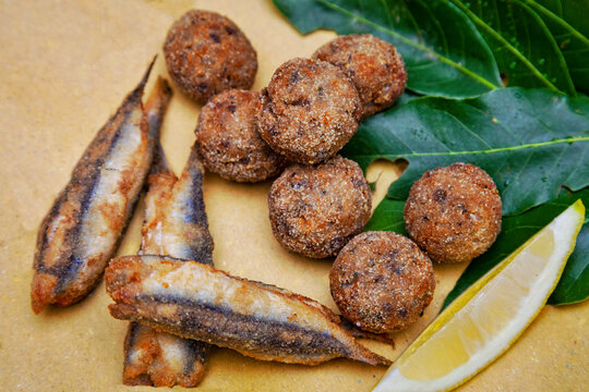 Fried anchovies and fishballs, italian cousine