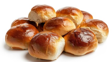 Close-up of freshly baked buns on a white surface