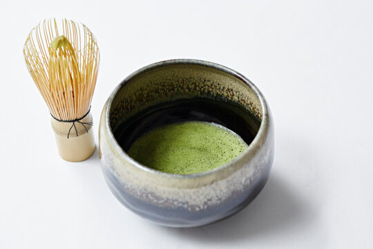 Matcha tea and a matcha whisk