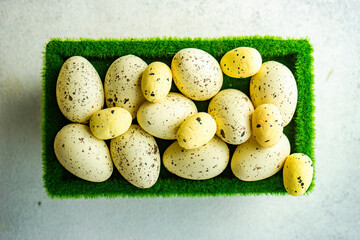 Easter concept with basket with green grass full of eggs