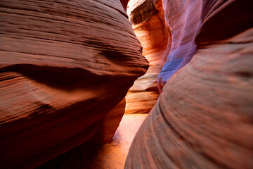 Colorful sandstone formations in a slot canyon, a natural attraction in Arizona USA. Gently eroded...