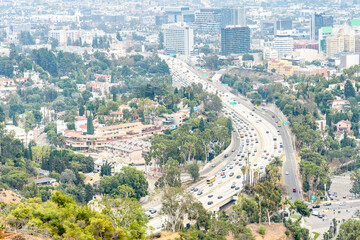 Aerial view of a busy freeway in Los Angels on a misty autumn morning