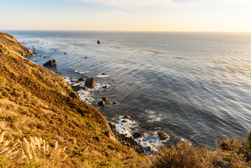 Stretch of unspoilt coast in Central California at sunset in autumn