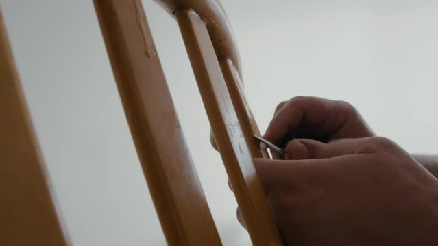 Restoration of a wooden chair. Close-up. Vintage things.