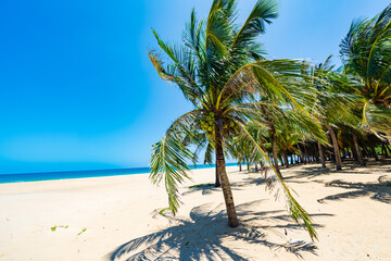 A group of small boats on the beach of Daidai Island, Lingshui, Hainan, China