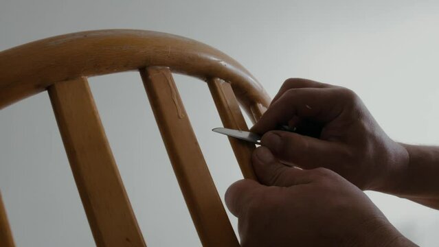Restoration of a wooden chair. Close-up. Vintage things.