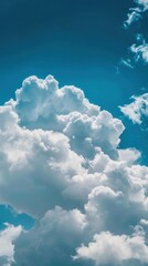 Vibrant Blue Sky Adorned with Fluffy White Clouds