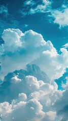 Vibrant Blue Sky Adorned with Fluffy White Clouds