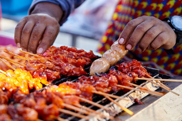 Grilled skewers chicken meat on barbecue grill