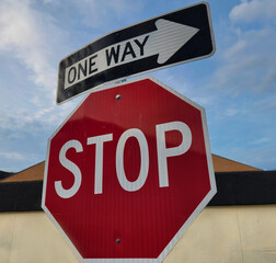 stop sign and one way sign