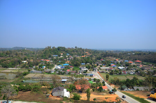 Aerial view landscape local Rim Kok village rural and Chiangrai country countryside on mountain hill of Wat Huay Pla Kang temple for thai people a foreign traveler travel visit in Chiang Rai, Thailand