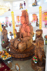 Carving wooden Quan Yin or wood Kuan Yin chinese goddess for thai people travelers travel visit...