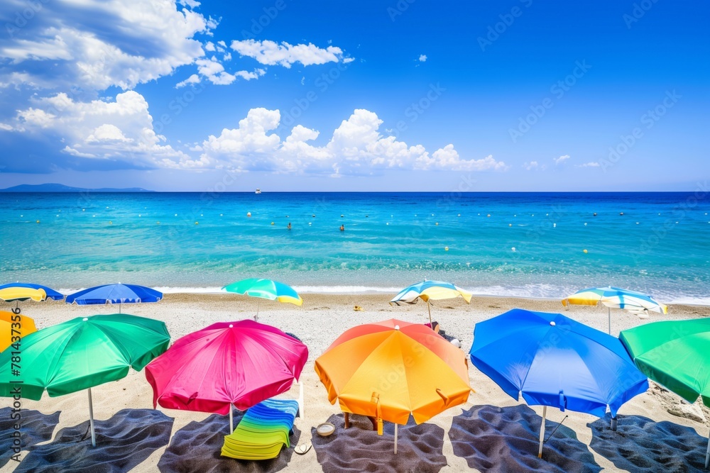 Poster a beach scene with many colorful umbrellas and chairs. scene is cheerful and inviting, as it seems l