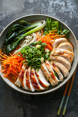 Hearty Oriental Noodle Soup with Chicken and Fresh Vegetables