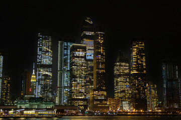 Fototapeta na wymiar Buindings and skyscrapers at night in New York City (USA)
