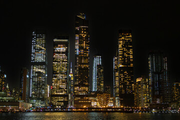 Fototapeta na wymiar Buindings and skyscrapers at night in New York City (USA)