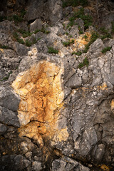 Texture dark rock in the coast 