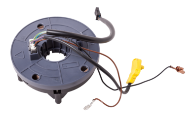 Steering angle sensor disassembled on a white isolated background, spare part for car repair or for sale at junk yard.