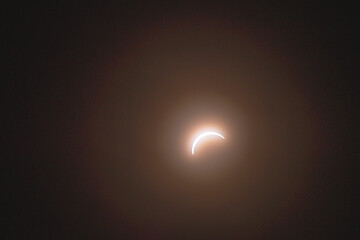 Naklejka premium Eclipse abstract moving clouds closing sun copy space background image
