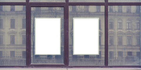 Two blank advertising spaces framed borders with white space for mockup in urban setting....