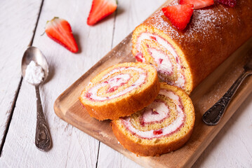 Swiss roll with strawberries and cream, homemde dessert - 781462106