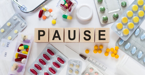 Pause Spelled Out With Pills and Capsules - obrazy, fototapety, plakaty