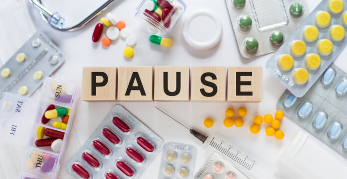 Pause Spelled Out With Pills and Capsules