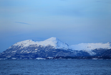 Fototapeta na wymiar View at the winter mountains near Molde (More og Romsdal, Norway).
