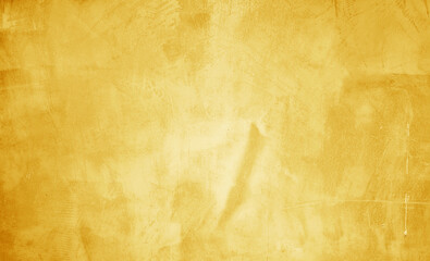 yellow plaster concrete wall texture use as background. premium yellow wallpaper with copy-space. background and texture of bare concrete wall. premium urban wallpaper.