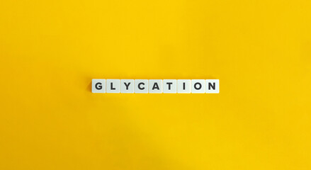 Glycation Word and Term. The Adduction of a Carbohydrate to another Biomolecule. Block Letter Tiles on Yellow Background. Minimalist Aesthetics.