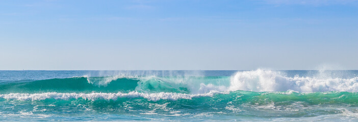 Panoramic shot of the sea with huge waves in Florianopolis, Brazil