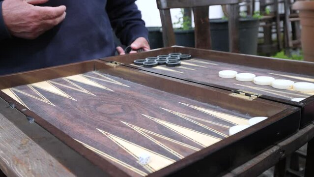 Backgammon Players Play Backgammon in the Open Air