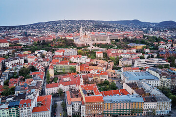Fototapeta na wymiar Panoramic view on skyline of Budapest along Danube River. Aerial view of capital of Hungary with historical buildings and famous landmarks
