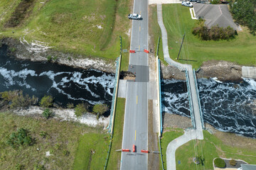 Repair of destroyed bridge after hurricane flood in Florida. Reconstruction of damaged road after...