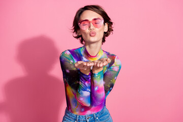 Photo of nice young woman closed eyes send air kiss you wear pullover isolated on pink color...
