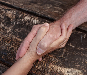 Old people holding hands close up view, senior retired family couple express care, friendship,...