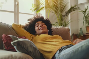 An African American young woman enjoying a moment of relaxation in a freshly cleaned and decluttered space.
