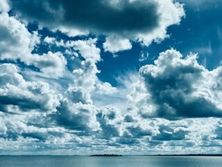 View of the sea and blue sky with white clouds. Summer photo landscape. - 781508753