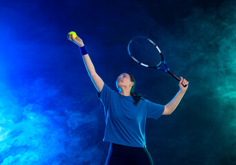 Tennis player woman with racket on tournament. Girl athlete with racket on open court with neon colors. Download a high quality photo for design of a sports app or tour events. - 781508905